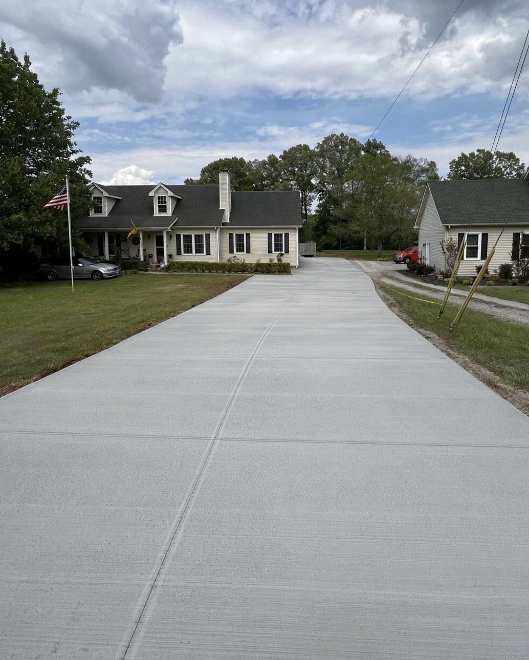 Wide view of a new concrete driveway — Complete Concrete TN