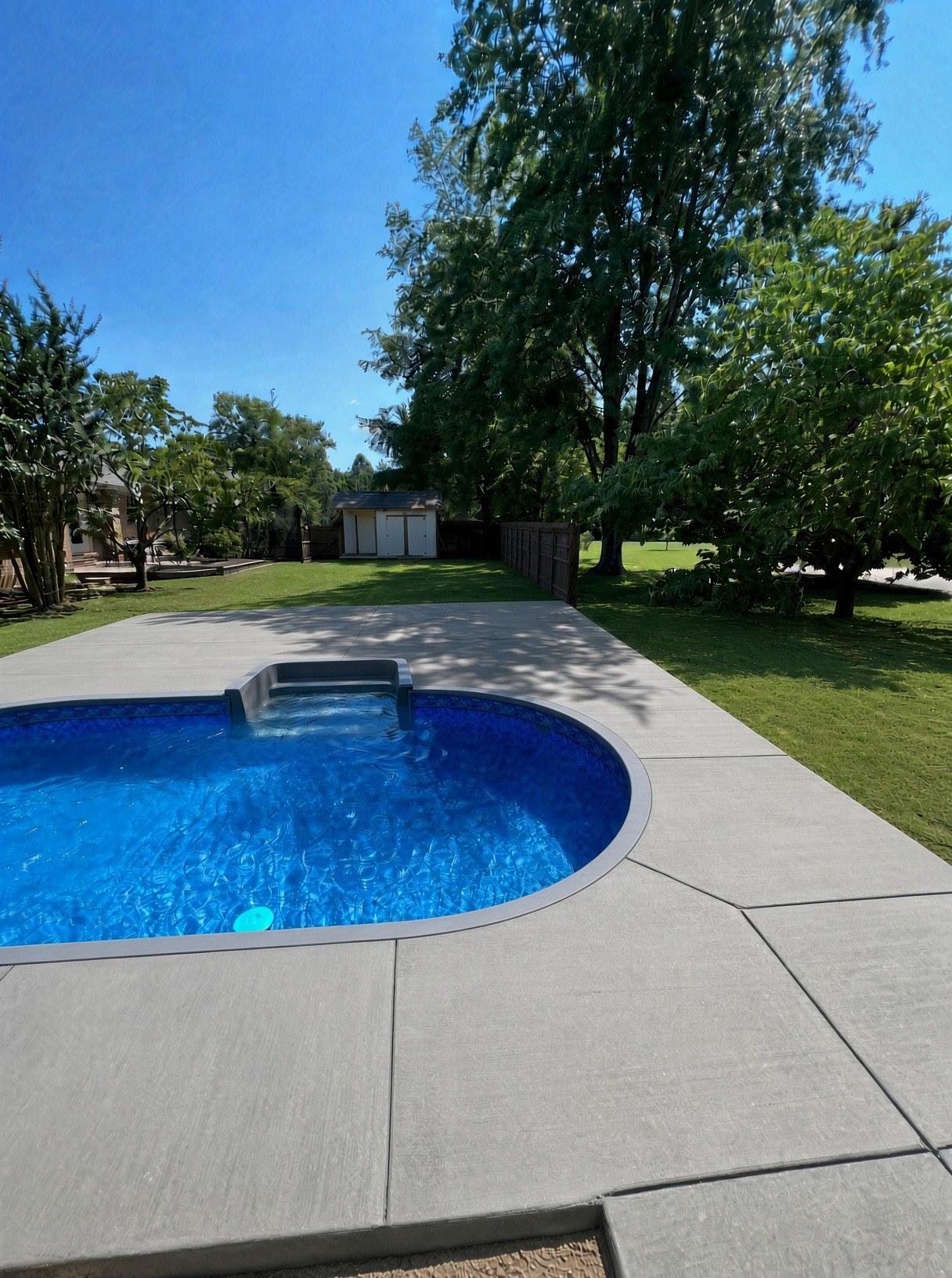Stamped pool deck surround — Complete Concrete TN